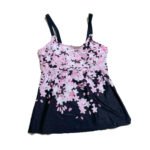 Women's two-piece beach swimsuit with black and pink gradient floral skirt