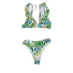 Summer beach women's two-piece swimsuit with green leaf pattern.
